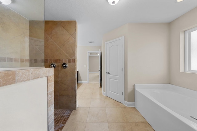 8152 Nevada St, Navarre, FL 32566 - bathroom with a bath, walk in shower, and tile patterned floors