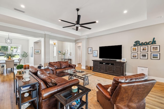 508 W Point Washington Rd, Santa Rosa Beach, FL 32459 - living room featuring a ceiling fan, a raised ceiling, light wood finished floors, crown molding, and recessed lighting