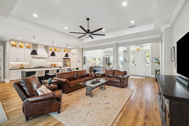 508 W Point Washington Rd, Santa Rosa Beach, FL 32459 - living room with a raised ceiling, a ceiling fan, light wood finished floors, recessed lighting, and crown molding
