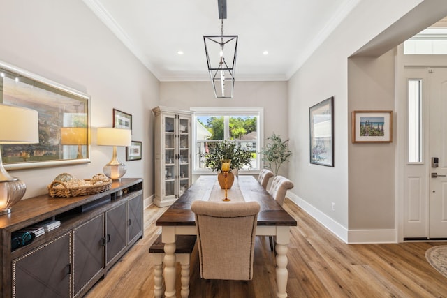 508 W Point Washington Rd, Santa Rosa Beach, FL 32459 - dining area with light wood-style flooring, ornamental molding, and recessed lighting
