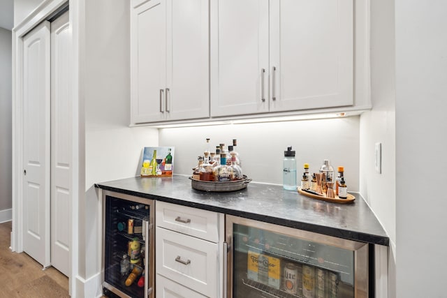 508 W Point Washington Rd, Santa Rosa Beach, FL 32459 - indoor dry bar with beverage cooler and wood finished floors