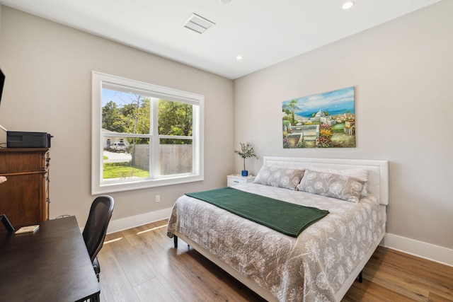 508 W Point Washington Rd, Santa Rosa Beach, FL 32459 - bedroom with wood finished floors, recessed lighting, and an office area