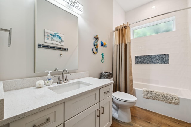 508 W Point Washington Rd, Santa Rosa Beach, FL 32459 - full bath featuring vanity, shower / bath combo with shower curtain, and wood finished floors