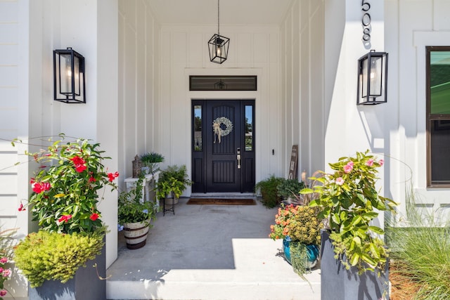 508 W Point Washington Rd, Santa Rosa Beach, FL 32459 - doorway to property with covered porch and board and batten siding