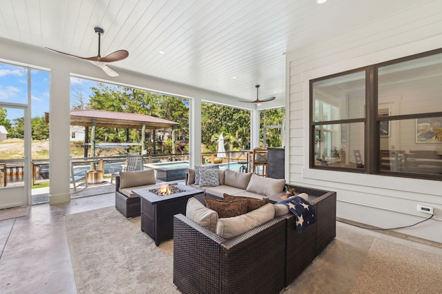 508 W Point Washington Rd, Santa Rosa Beach, FL 32459 - view of patio / terrace featuring ceiling fan and an outdoor living space with a fire pit