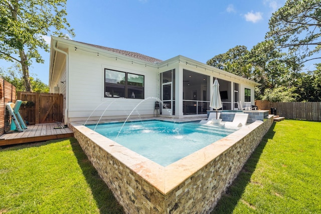 508 W Point Washington Rd, Santa Rosa Beach, FL 32459 - back of property featuring a sunroom, a deck, and a fenced backyard