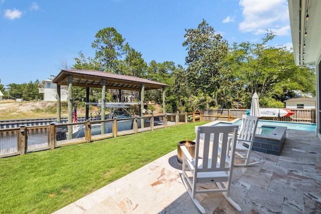 508 W Point Washington Rd, Santa Rosa Beach, FL 32459 - fenced backyard with a fire pit and a patio area