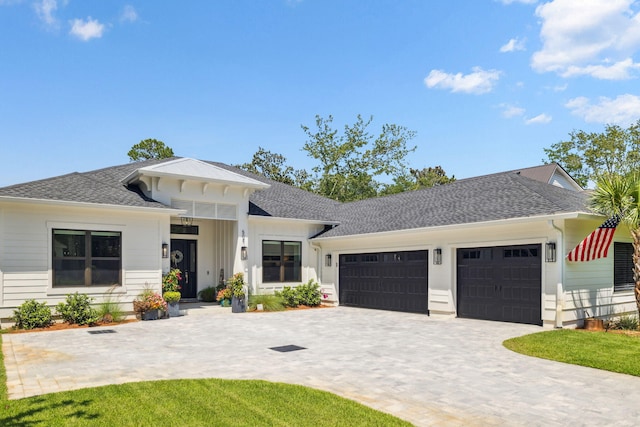 508 W Point Washington Rd, Santa Rosa Beach, FL 32459 - view of front of home featuring an attached garage, decorative driveway, and a shingled roof