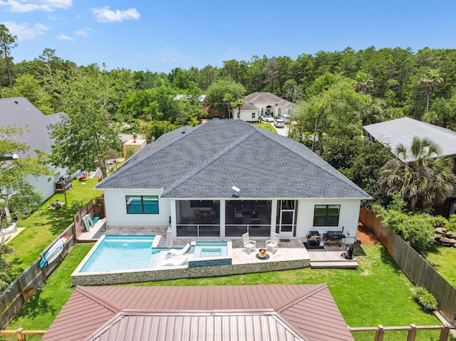 508 W Point Washington Rd, Santa Rosa Beach, FL 32459 - rear view of property featuring a fenced backyard, a wooden deck, a shingled roof, and a sunroom
