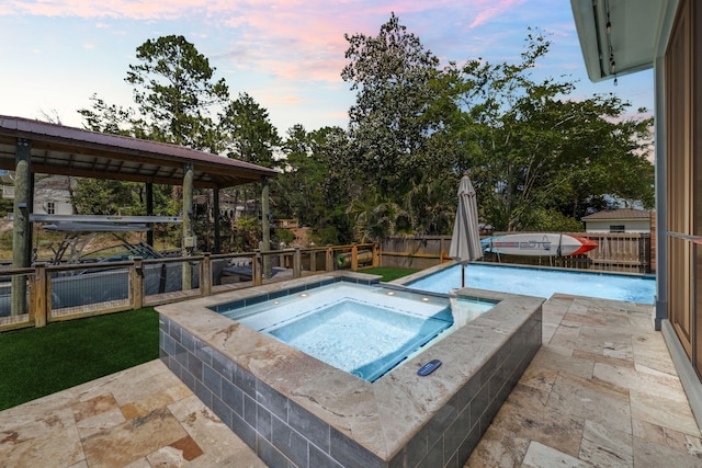 508 W Point Washington Rd, Santa Rosa Beach, FL 32459 - view of swimming pool featuring an in-ground hot tub, a fenced backyard, and a patio area