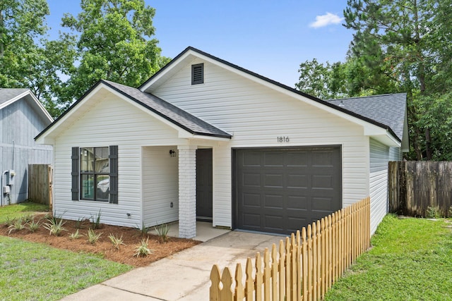 1816 Madelons Path, Fort Walton Beach, FL 32547 - view of front of home with roof with shingles, an attached garage, and concrete driveway