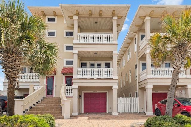 19108 Front Beach Rd Unit A & B, Panama City Beach, FL 32413 - view of property with an attached garage and decorative driveway