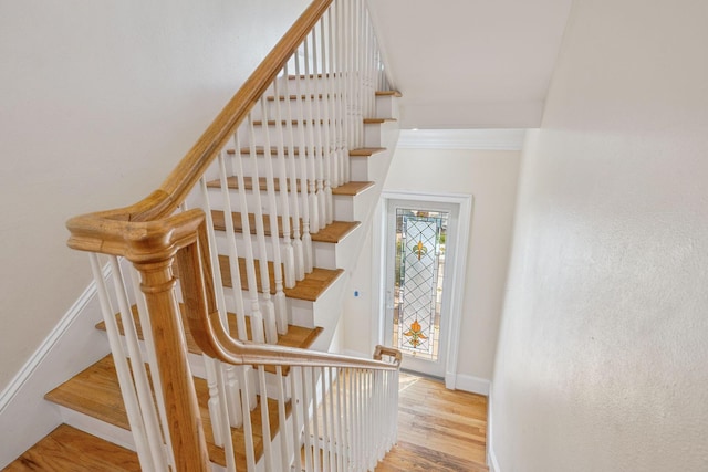 19108 Front Beach Rd Unit A & B, Panama City Beach, FL 32413 - stairway featuring wood finished floors and ornamental molding