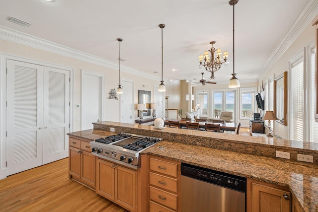 19108 Front Beach Rd Unit A & B, Panama City Beach, FL 32413 - kitchen featuring appliances with stainless steel finishes, light wood-style floors, open floor plan, crown molding, and hanging light fixtures