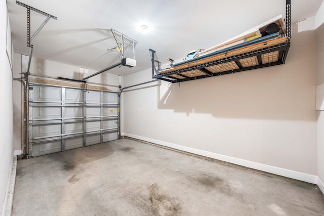 1819 Stable Ln, Fort Walton Beach, FL 32547 - garage with baseboards and a garage door opener