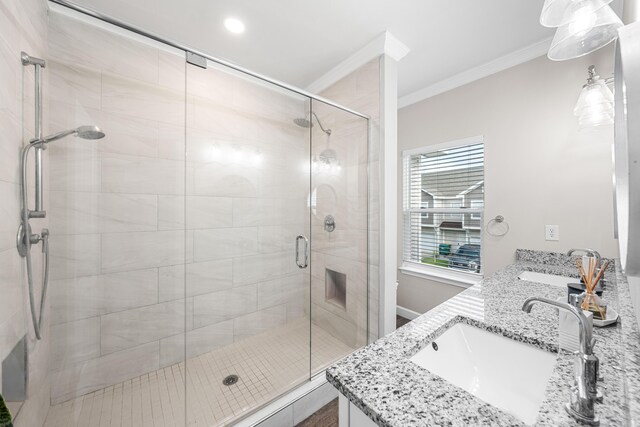 1819 Stable Ln, Fort Walton Beach, FL 32547 - full bathroom with crown molding, double vanity, and a stall shower