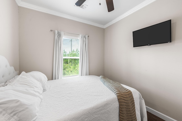 1819 Stable Ln, Fort Walton Beach, FL 32547 - bedroom featuring ornamental molding, wood finished floors, and a ceiling fan