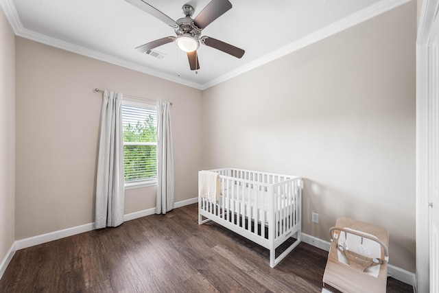 1819 Stable Ln, Fort Walton Beach, FL 32547 - bedroom with ornamental molding, wood finished floors, a nursery area, and a ceiling fan