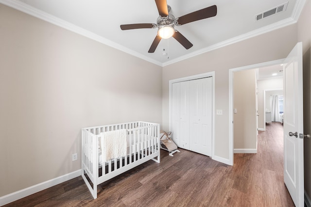 1819 Stable Ln, Fort Walton Beach, FL 32547 - bedroom with ornamental molding, wood finished floors, a closet, and a ceiling fan