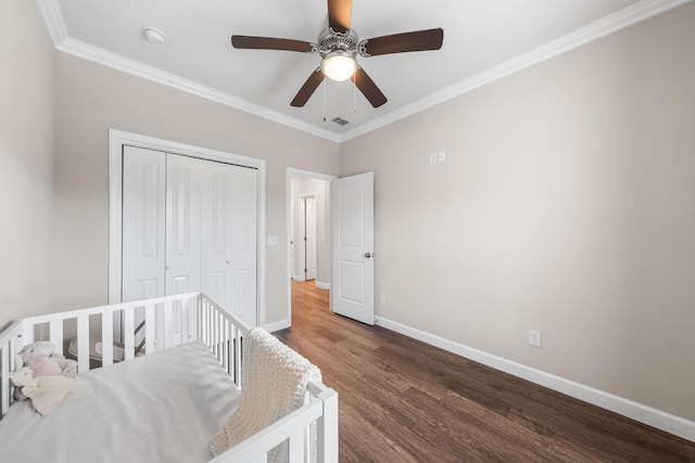 1819 Stable Ln, Fort Walton Beach, FL 32547 - bedroom with wood finished floors, ornamental molding, a closet, and ceiling fan