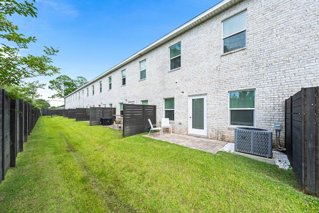 1819 Stable Ln, Fort Walton Beach, FL 32547 - rear view of property featuring a fenced backyard and a patio area