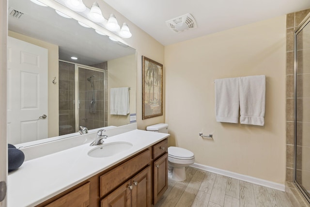 15100 Emerald Coast Pkwy Unit 602, Destin, FL 32541 - full bath with a tile shower, vanity, and wood finished floors