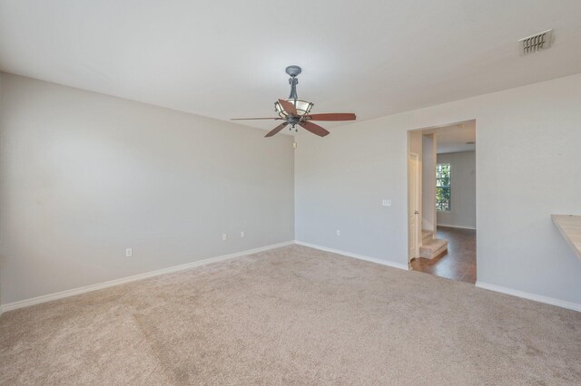 715 Presscott St, Crestview, FL 32536 - spare room featuring ceiling fan and carpet floors