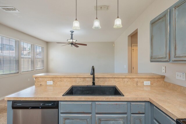 715 Presscott St, Crestview, FL 32536 - kitchen featuring dishwasher, ceiling fan, pendant lighting, light countertops, and blue cabinetry