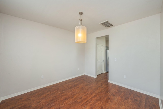 715 Presscott St, Crestview, FL 32536 - unfurnished room with dark wood-style flooring and baseboards