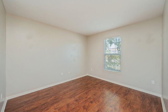 715 Presscott St, Crestview, FL 32536 - spare room with dark wood finished floors and baseboards