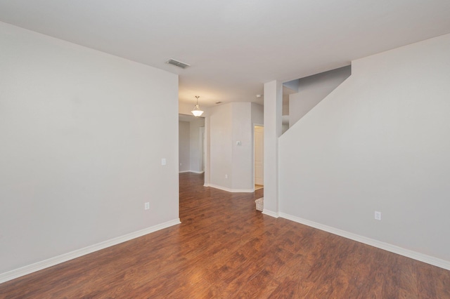 715 Presscott St, Crestview, FL 32536 - empty room featuring wood finished floors and baseboards
