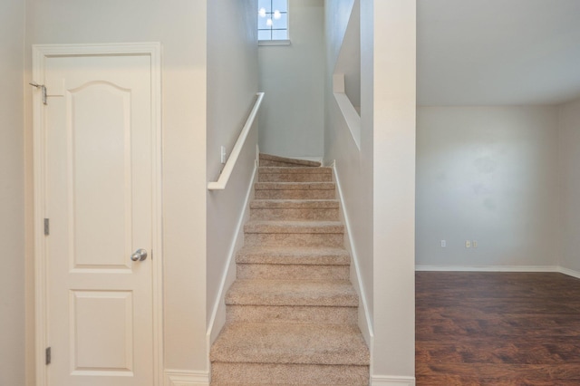 715 Presscott St, Crestview, FL 32536 - stairway featuring wood finished floors and baseboards