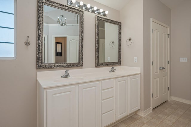 715 Presscott St, Crestview, FL 32536 - full bath featuring a chandelier and double vanity