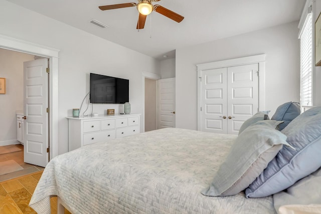 386 Grande Pointe Cir, Inlet Beach, FL 32461 - bedroom featuring a closet, light wood-type flooring, and ceiling fan