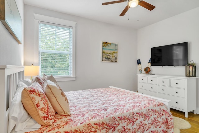 386 Grande Pointe Cir, Inlet Beach, FL 32461 - bedroom with light wood-style floors and ceiling fan