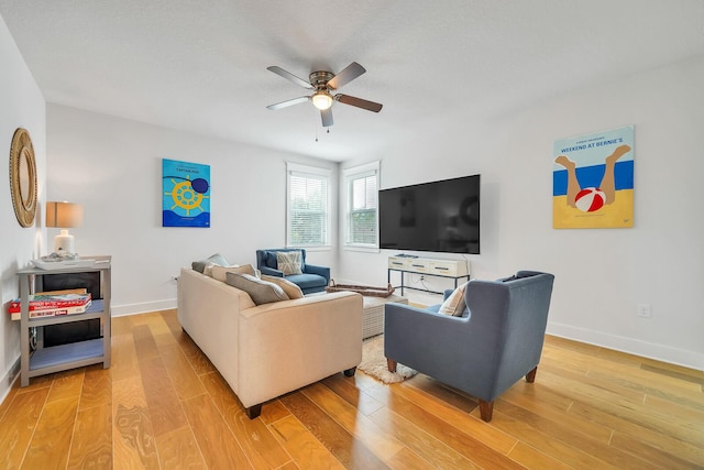 386 Grande Pointe Cir, Inlet Beach, FL 32461 - living area with a ceiling fan and light wood-style floors