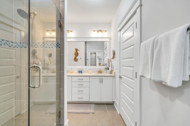 386 Grande Pointe Cir, Inlet Beach, FL 32461 - full bath with vanity, a shower stall, and tile patterned flooring