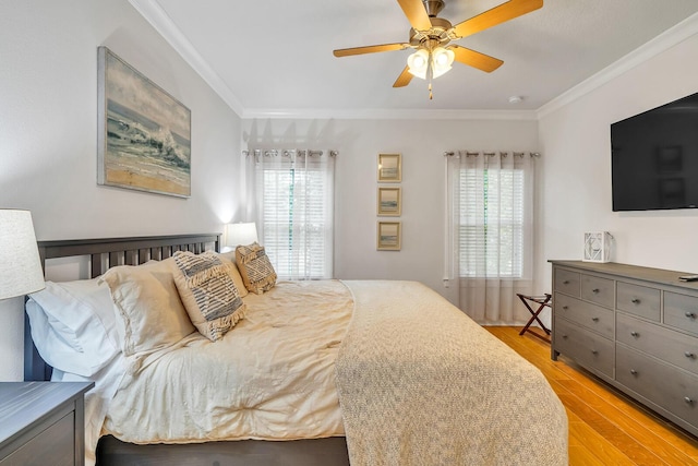 386 Grande Pointe Cir, Inlet Beach, FL 32461 - bedroom featuring ornamental molding, light wood-style floors, multiple windows, and a ceiling fan