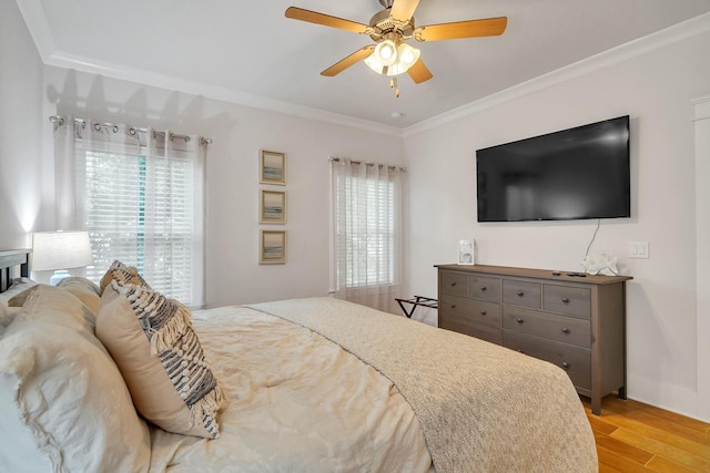 386 Grande Pointe Cir, Inlet Beach, FL 32461 - bedroom with light wood-type flooring, crown molding, and ceiling fan