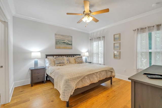 386 Grande Pointe Cir, Inlet Beach, FL 32461 - bedroom with crown molding, light wood-style floors, and a ceiling fan