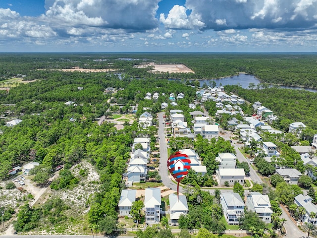 386 Grande Pointe Cir, Inlet Beach, FL 32461 - aerial view of residential area featuring a forest and a nearby body of water