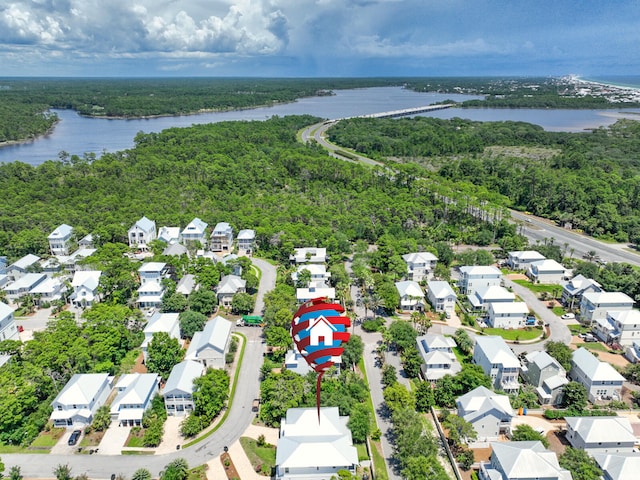 386 Grande Pointe Cir, Inlet Beach, FL 32461 - aerial view of residential area with a large body of water and a forest