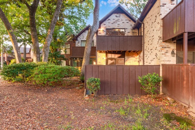 3871 Indian Trl Unit 3E, Destin, FL 32541 - view of home's exterior with brick siding