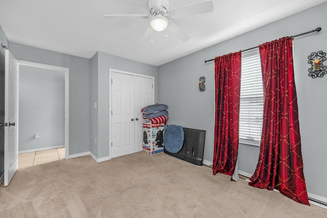 118 Cabana Way, Crestview, FL 32536 - unfurnished bedroom with carpet floors, a ceiling fan, and a closet