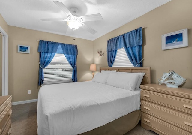 2396 Scenic Gulf Dr Unit 210, Miramar Beach, FL 32550 - bedroom with a ceiling fan and baseboards