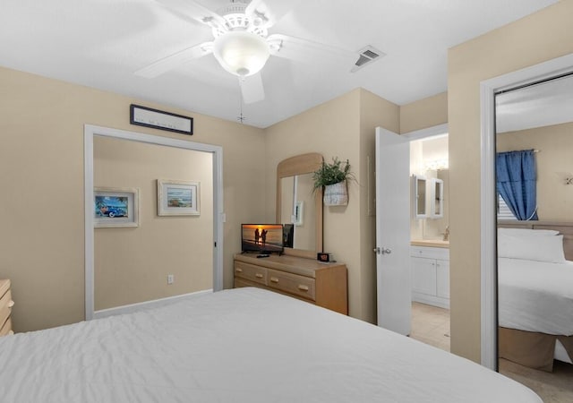 2396 Scenic Gulf Dr Unit 210, Miramar Beach, FL 32550 - bedroom with ceiling fan and connected bathroom