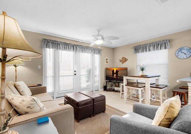 2396 Scenic Gulf Dr Unit 210, Miramar Beach, FL 32550 - living room with carpet and a ceiling fan
