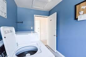 2396 Scenic Gulf Dr Unit 210, Miramar Beach, FL 32550 - washroom with washer and dryer and attic access