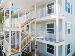 2396 Scenic Gulf Dr Unit 210, Miramar Beach, FL 32550 - view of building exterior with stairway
