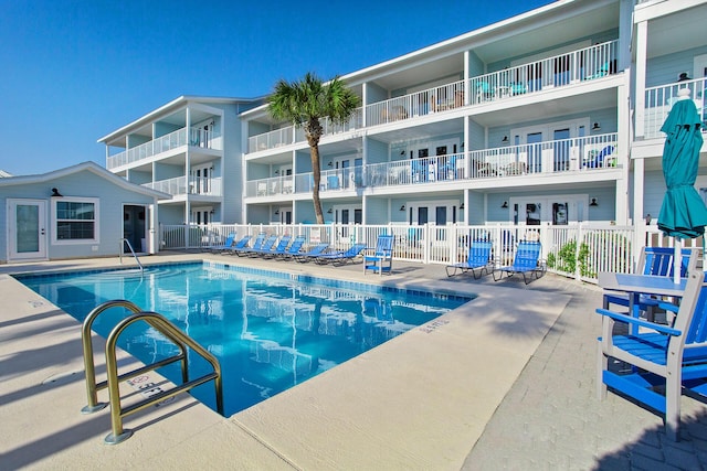 2396 Scenic Gulf Dr Unit 210, Miramar Beach, FL 32550 - community pool featuring french doors and a patio